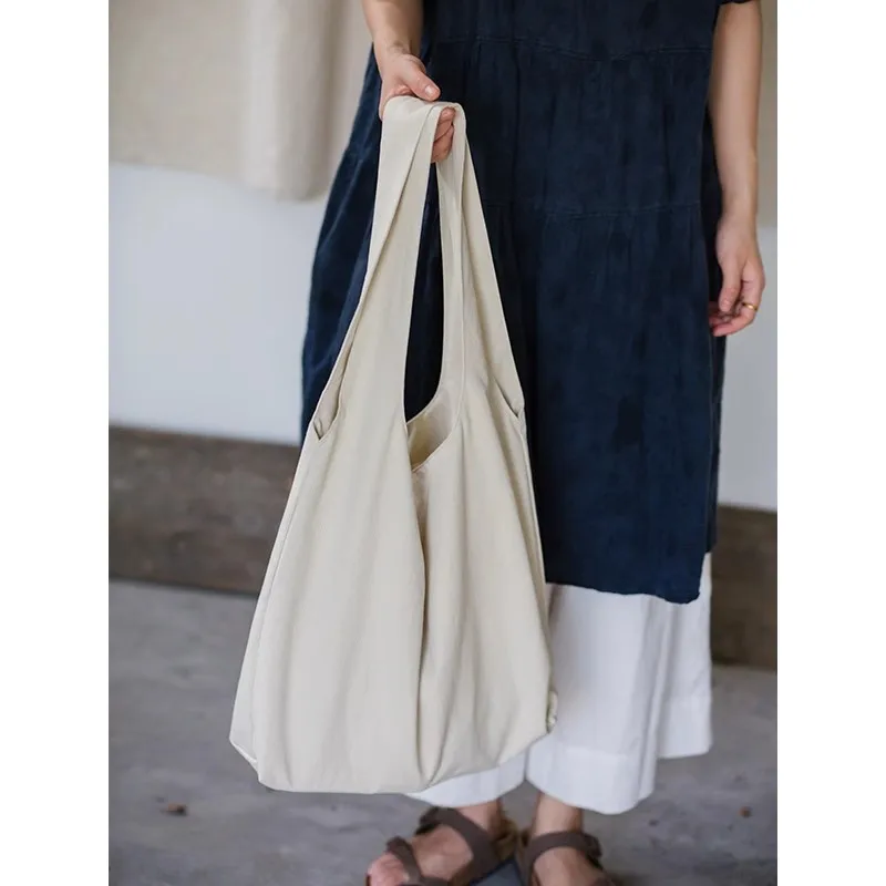 nova-bolsa-tote-de-algodao-e-linho-estilo-japones-com-alca-Unica-grande-capacidade-e-sensacao-solta-ideal-para-uso-casual