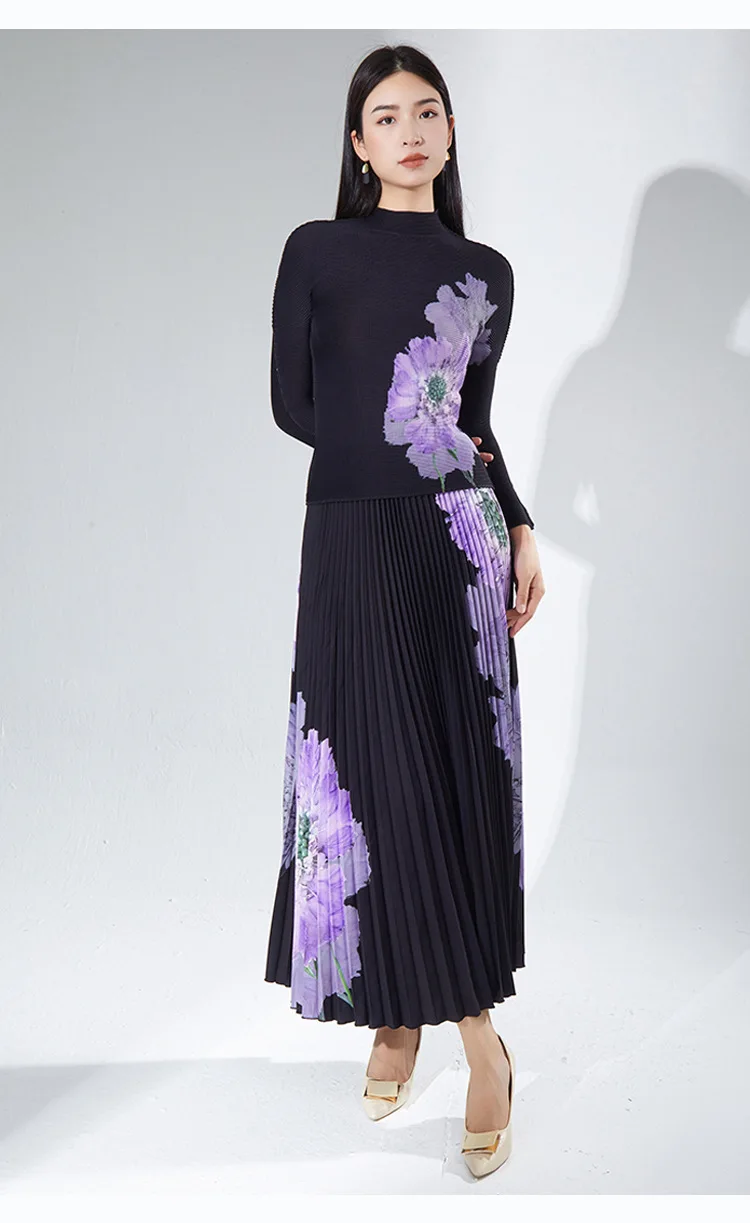A complete outfit for women, including a long-sleeved t-shirt and a printed pleated skirt – a two-piece set.