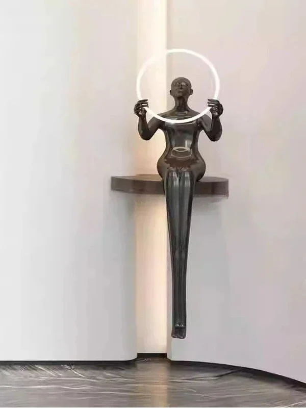 A  Abstract human body sitting art sculpture humanoid ornament figure image luminous object