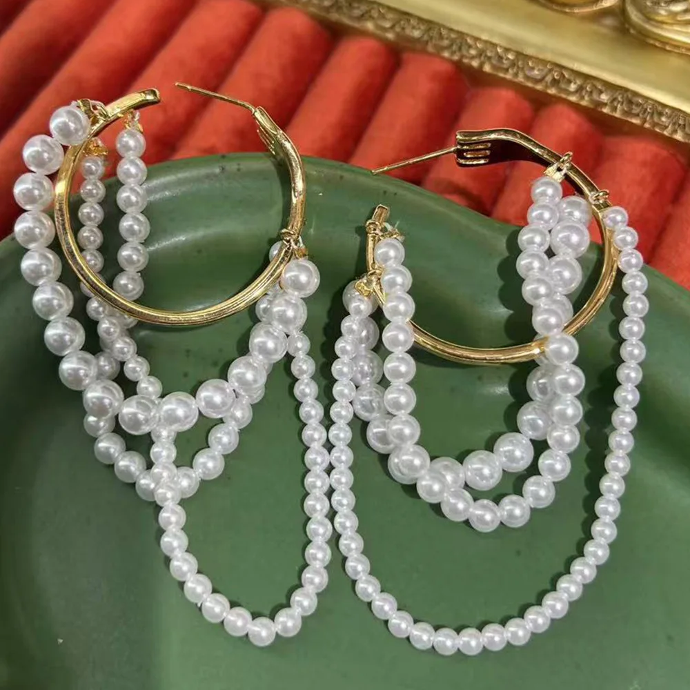Hejia tassel handmade ins cross-border hot-selling high-end imitation pearl Maillard light luxury simple is S925 earrings
