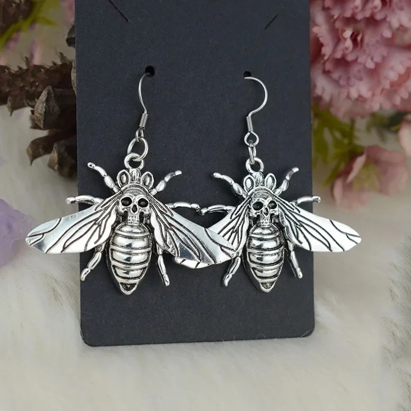 

Skull Moth earrings,Gothic jewelry,Vintage,Witch accessories,pagan,insect,alternative,Punk,Moth Charm,ear hooks For Women Girls