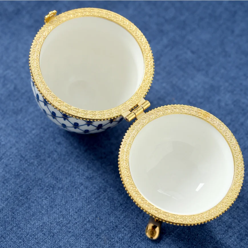 Ceramic gold-plated three legged egg shaped ceramic jewelry box, French hand-painted gold-plated cover box, antique rack decorat