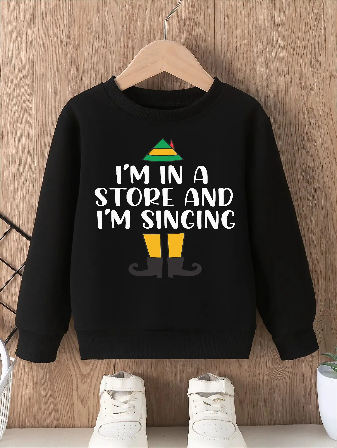 Festive print boy's crewneck sweatshirt with cheerful holiday-themed design, comfortable long-sleeved top for everyday wear