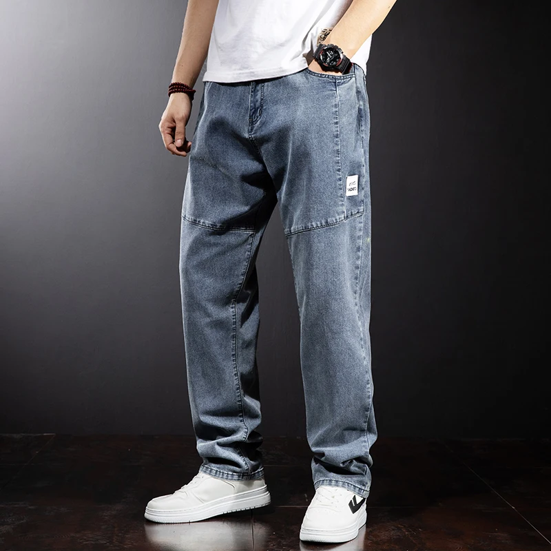 

Ультрамягкие эластичные мужские джинсы из ледяного шелка, летние тонкие прямые брюки свободного кроя больших размеров, модные повседневные длинные брюки