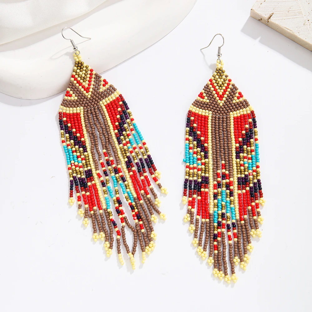 Rice bead earrings Tassel Fashion Simple Design Bohemia Hand knitting Alloy Geometry Beaded earrings