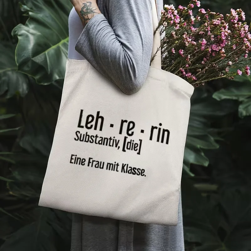 حقيبة حمل بعبارة إسبانية للسيدات من Achu llevo cosas de senora (I Have the Lady's Things) - حقيبة يد باللغة الإسبانية باللون البيج والأحمر