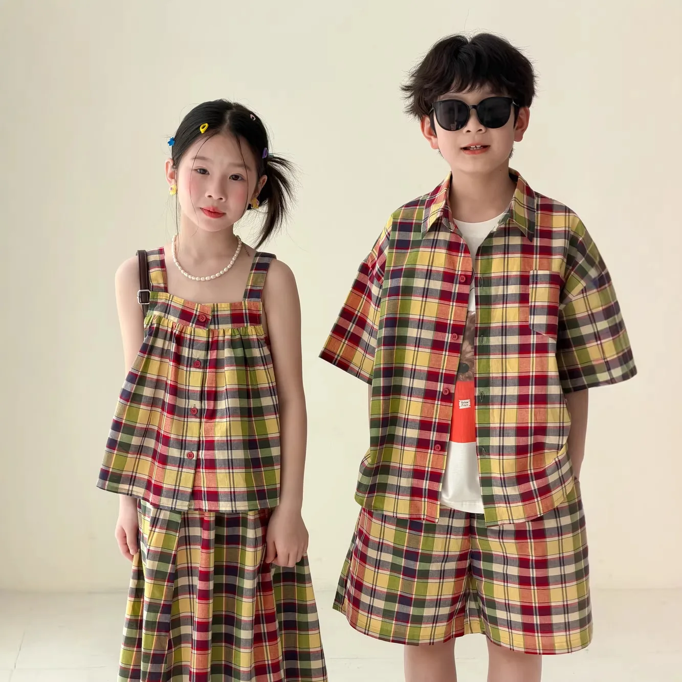 

2026 Summer Sibling Matching Outfits Kids Plaid 2PCS Set Boy Short Sleeve Shirt Shorts Girl Cami Top Midi Skirt Casual Clothes