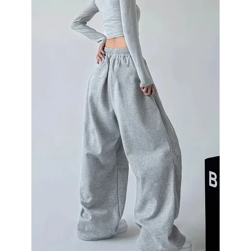 Los pantalones de pierna recta para mujer American Street son casuales y de moda, adecuados tanto para hombres como para mujeres en otoño e invierno.