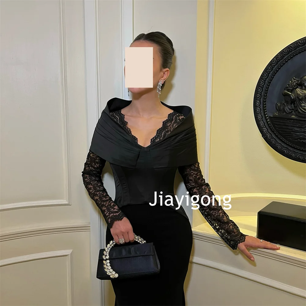 Abiti lunghi con scollo a V a sirena in pizzo con pieghe in jersey semplice personalizzato Taglie per feste su misura disponibili di alta qualità