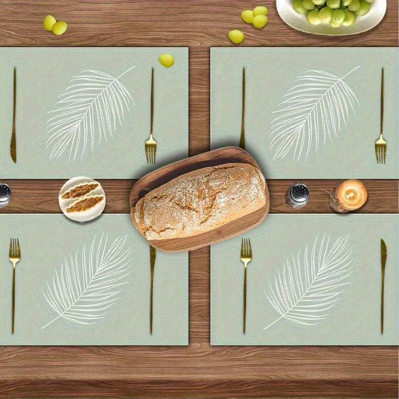 VIKAMA 4 Stück Tischsets mit Palmenblatt-Motiv, hellgrüner Stoff, wasserdicht, hitzebeständig, rutschfest, für die Dekoration von Küchen- und Esstischen