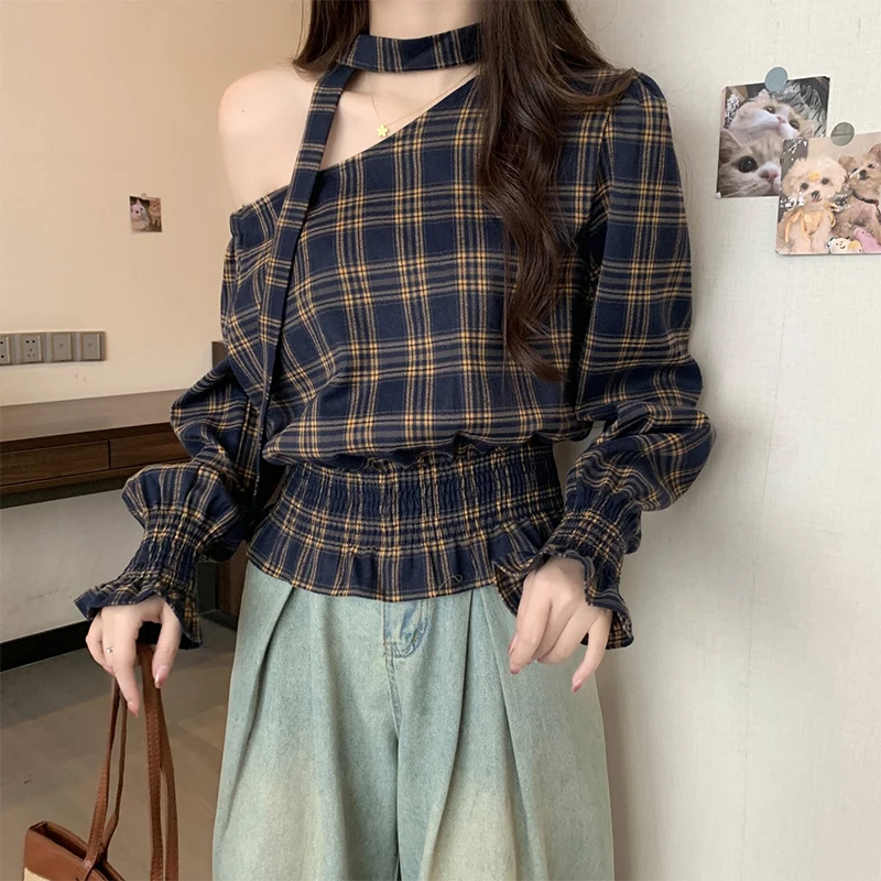 2025 Otoño e Invierno nueva camisa de manga larga con hombros oblicuos irregulares Top de cintura a cuadros Retro para mujer