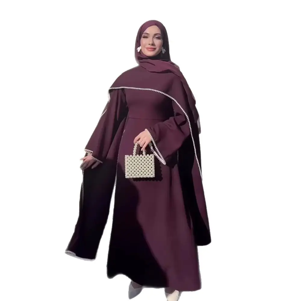 عبايات بتصميم روب طويل، فساتين كافتان مفتوحة من الأمام بتطريز لؤلؤي، فساتين حفلات بتصميم كاب مطوي وأكمام طويلة مطرزة بالخرز، روب طويل 14