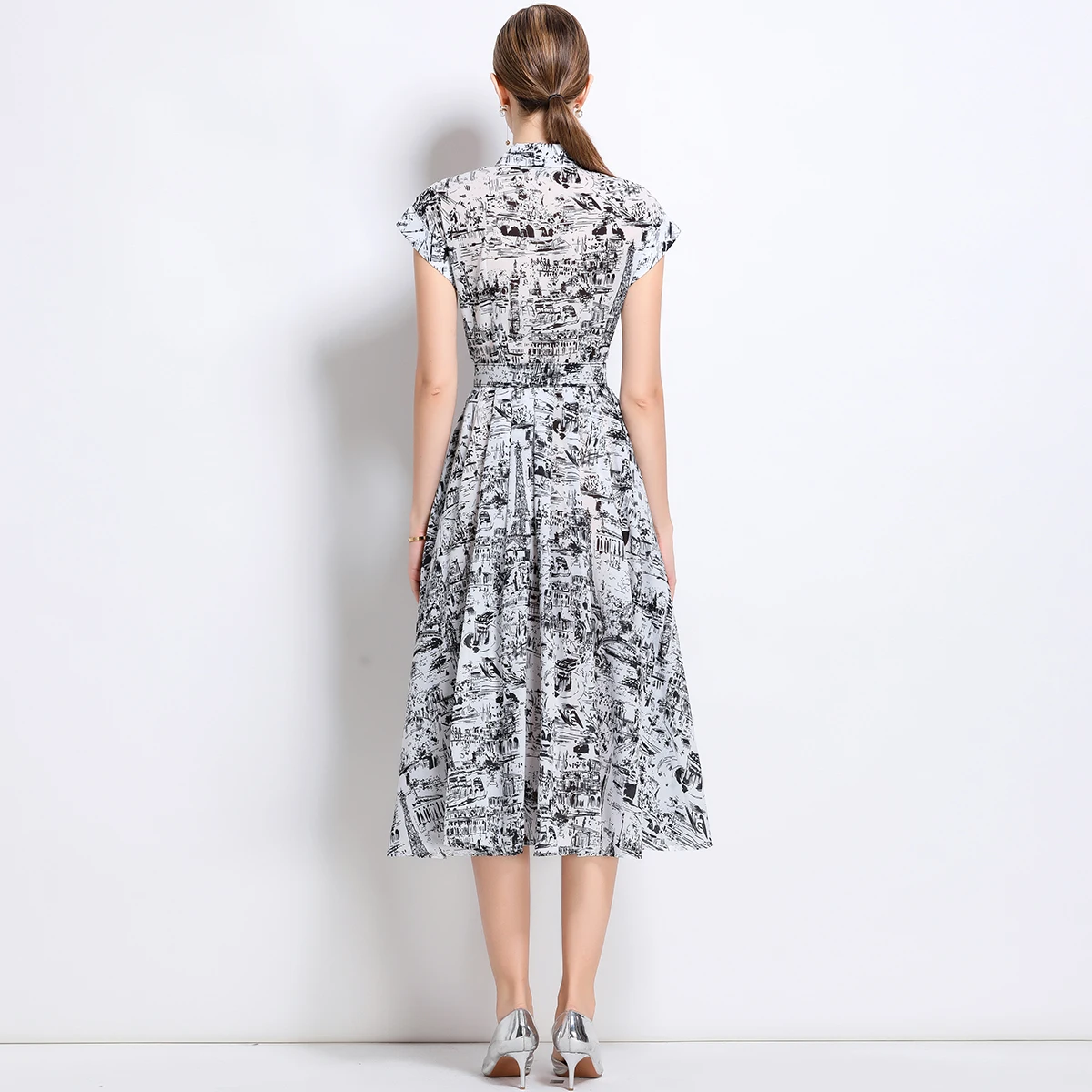Nieuwe zomer revers korte mouw lange jurk high-end bedrukte blad runway een lijn riem slanke kantoorfeest lange jurken