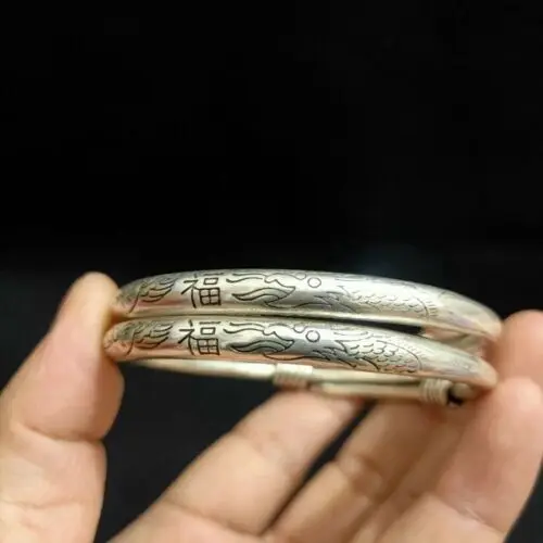 

A Pair Exquisite Old Chinese Tibet Silver Handcarved Dragon Phoenix Bracelets