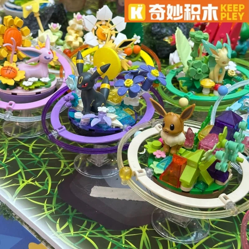 keeppley-anime-pokemon-bloques-de-construccion-dibujos-animados-eevee-familia-planeta-serie-montaje-modelo-juguete-adornos-coleccion-regalo