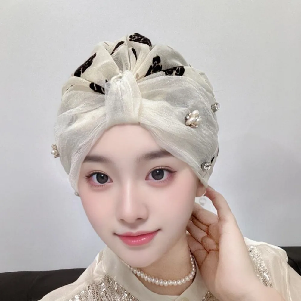 أزياء الصيف الجديدة النمط الغربي باوتو قبعة اللؤلؤ طبعة رقيقة تغطي الشعر الأبيض الأسود الحجاب مجموعة أنيقة المرأة