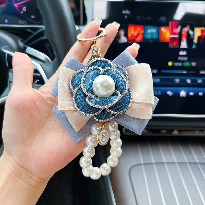 Creative contrasting denim color series camellia pearl necklace keychain bag pendant fashionable car keychain pendant