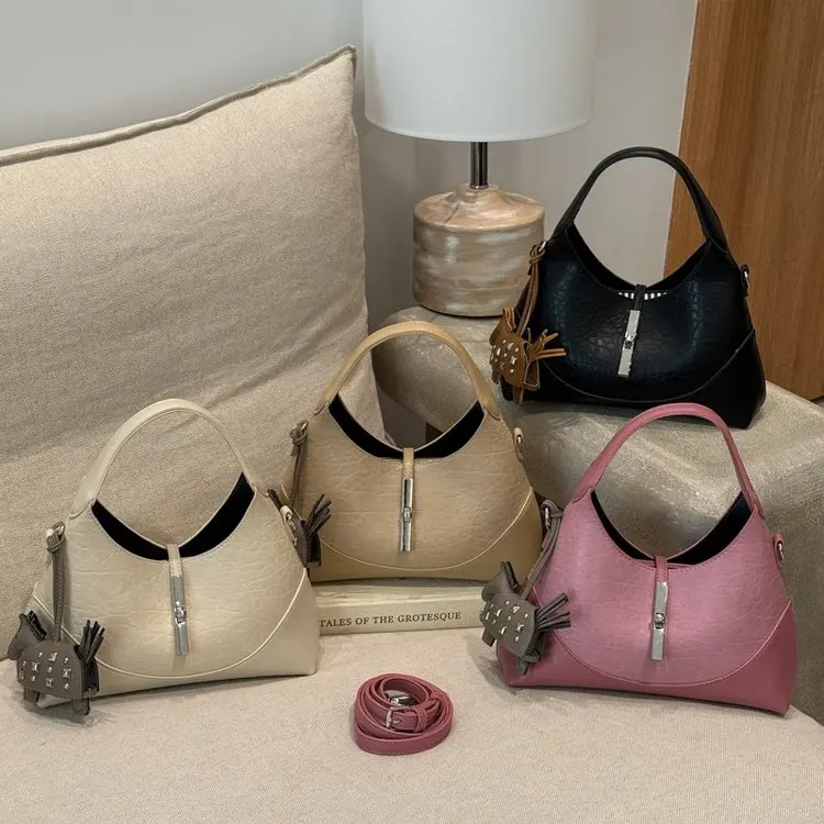 

2026 New High-value Retro Contrasting Color Dumpling Bag Large Capacity Simple Daily Commuting Portable Shoulder Armpit Bag