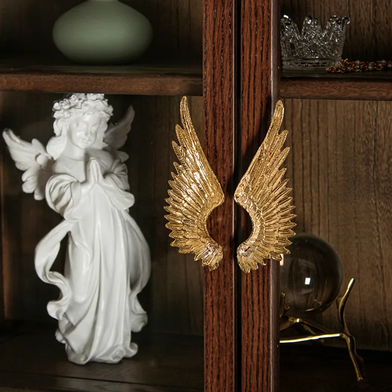 مقابض أبواب نحاسية أحادية الفتحة في الشمال ، وسحّابات الجناح ، وديكور خزانة الملابس الذهبية ، ومقابض أدراج أنيقة ، فريدة وفريدة من نوعها