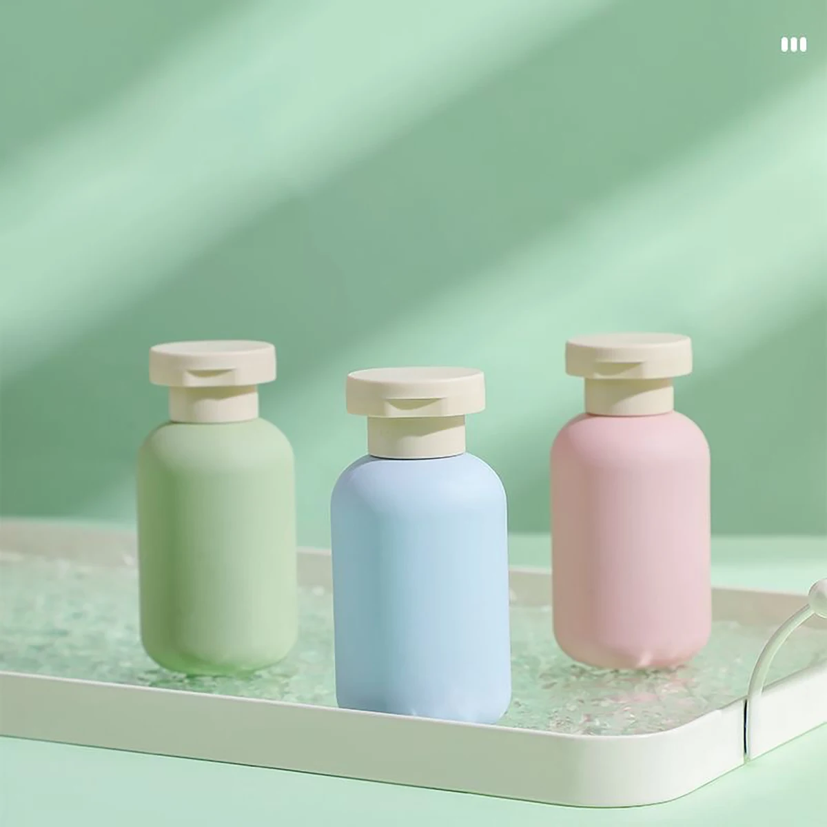 100-ml-Flasche mit Flockbeschichtung, neues Shampoo, Duschgel, Reiseartikel, tragbare Probe-Reiseverteilungsflasche