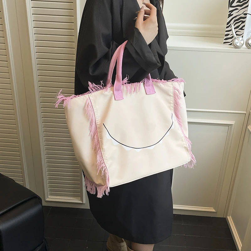 

Fashion Solid Color Nylon Tassel Shoulder Bags 2026 Hot Sale Design Simple Handbags High Quality Large Capacity Sweet Ladies Bag