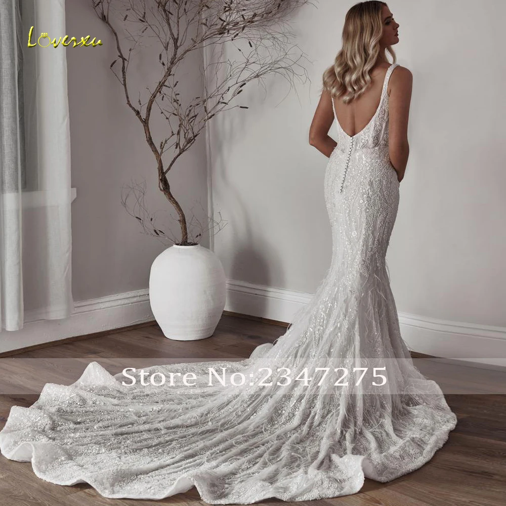 Loverxu حورية البحر فساتين زفاف مثيرة على شكل قلب بدون أكمام فيستدو دي نوفيا دانتيل مطرز لامع مصنوع حسب الطلب فستان زفاف