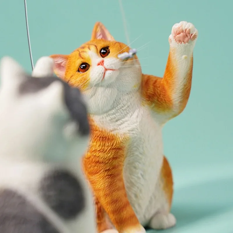 British shorthair cat, cute waving cat pet teasing cat stick wrist wrestling cat ornament figure periphery