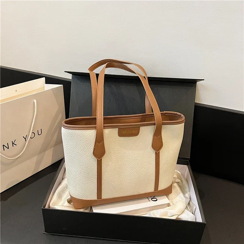 

1 Fashion Brand Handbag New Large Capacity Shoulder Bag High-end Women's Bag Fashion Niche Leisure Handbag Ladies Tote Bag
