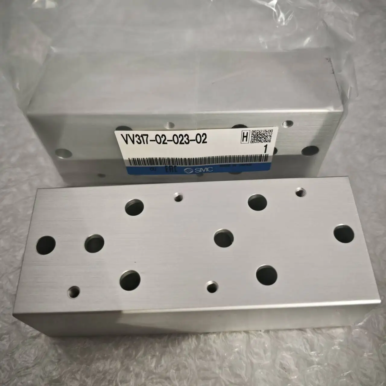 

Original SMC Solenoid Valve Base Direct Acting Seat Valve VV5FS2-01T-125-02 VV317-02-023-02 VV317-02-043-02 Combiner Plate