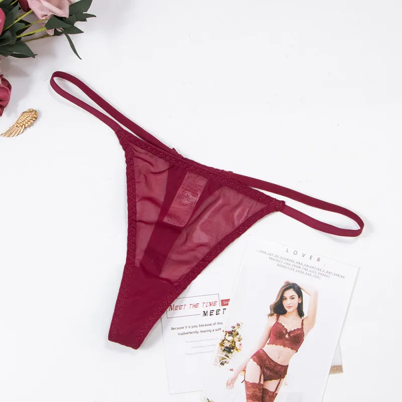 Thong jaring seksi Eropa dan Amerika godaan perspektif transparan ultratipis celana dalam pinggang rendah celana T sabuk tipis wanita