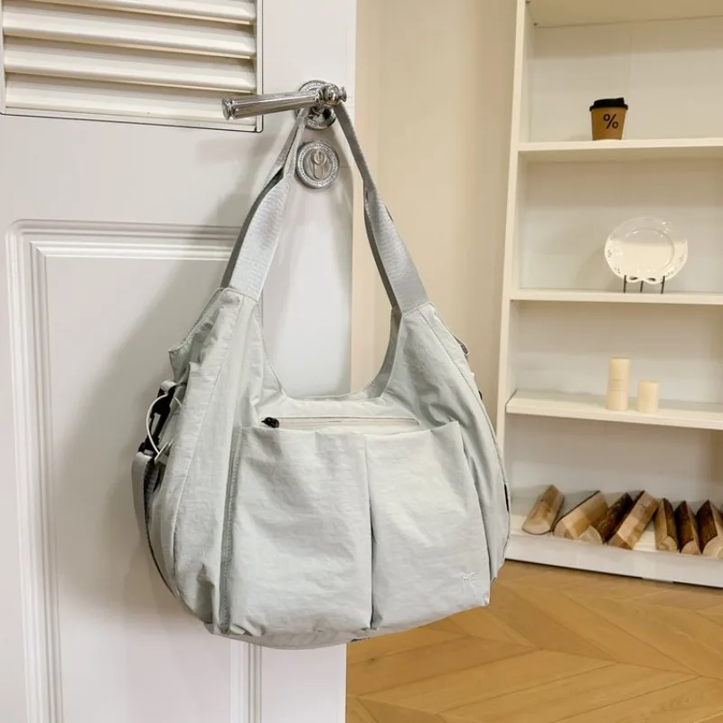 

Стильная простая сумка-мессенджер для женщин, роскошная кожаная сумка через плечо, классическая дизайнерская сумка-тоут, идеально подходит как вместительная сумка для подгузников.