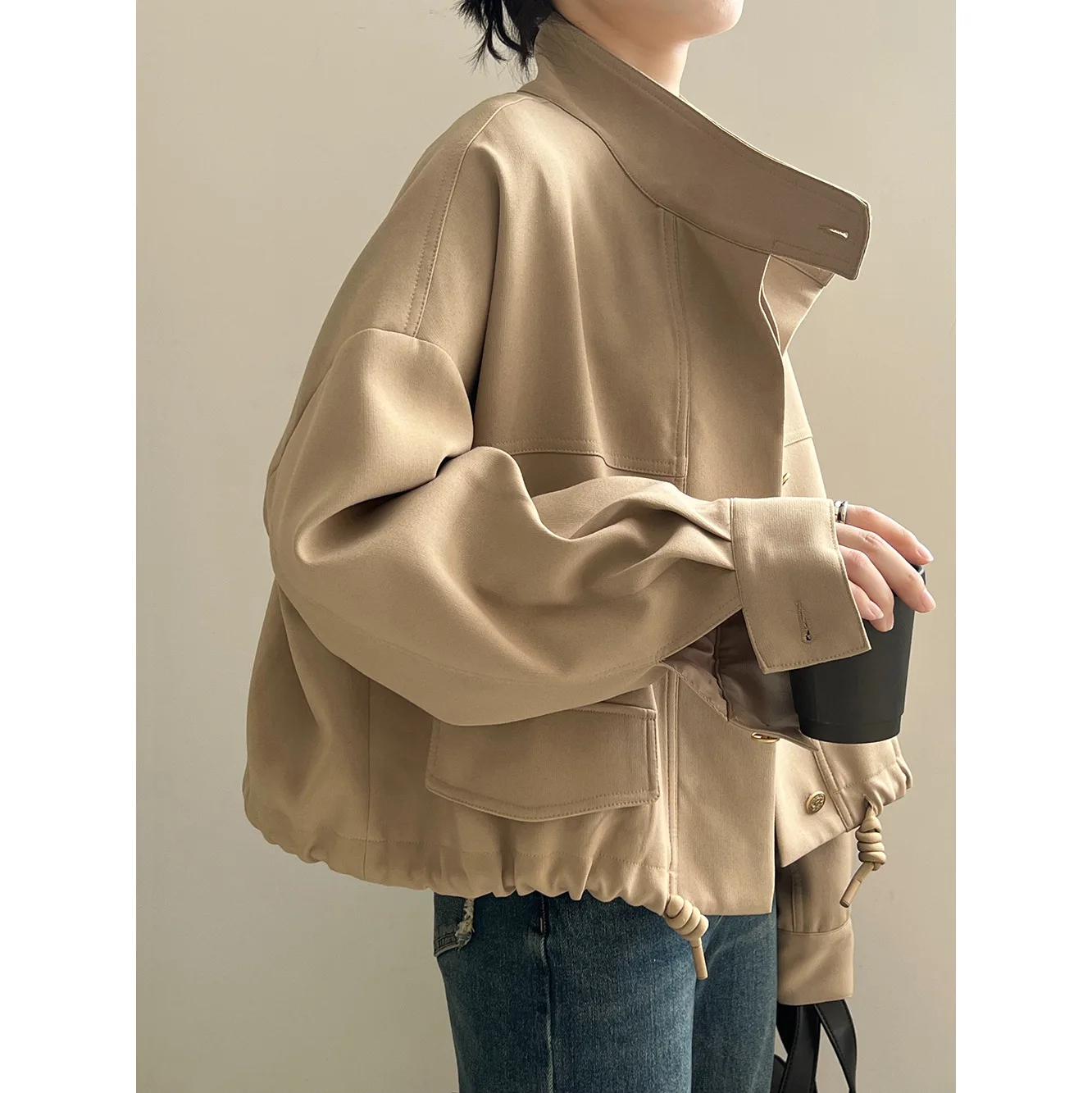 

Korean standing collar jacket cardigan women's early spring new loose hem drawstring short jacket