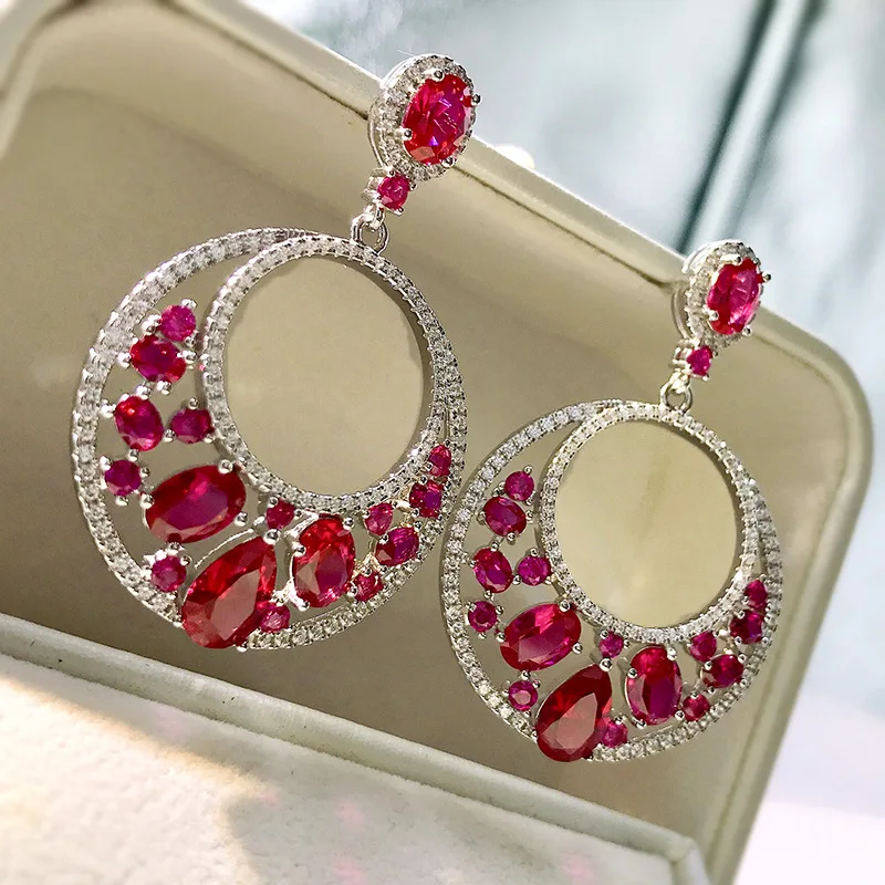 Highcarbon diamond inlaid with water droplets 6 * 9 pigeon blood red European and American luxury style ice flower s925 earrings