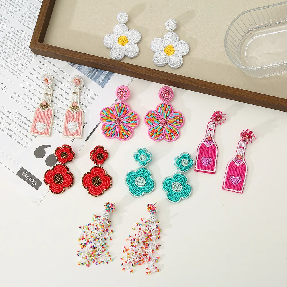 

Rice bead earrings Flowers Originality Hand knitting Bottle Design Fashion Bohemia Alloy Female Fabric art Beaded earrings
