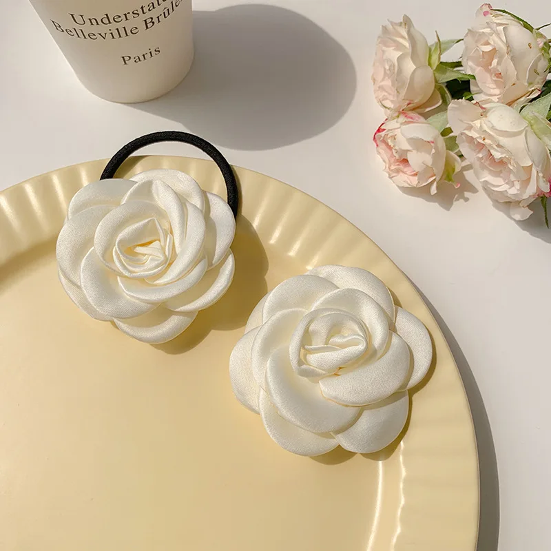 

2pcs white camellia hair tie for women; sweet and charming hairband for hair; versatile head accessory; rubber band hair clip