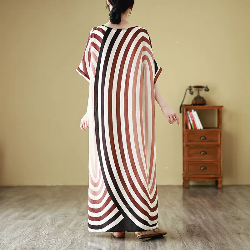 تنورة شاطئ طويلة فضفاضة للصيف والجولة من حرير Ne Yangyun مقاس كبير للنساء رداء دكتور فني للعطلات على الشاطئ