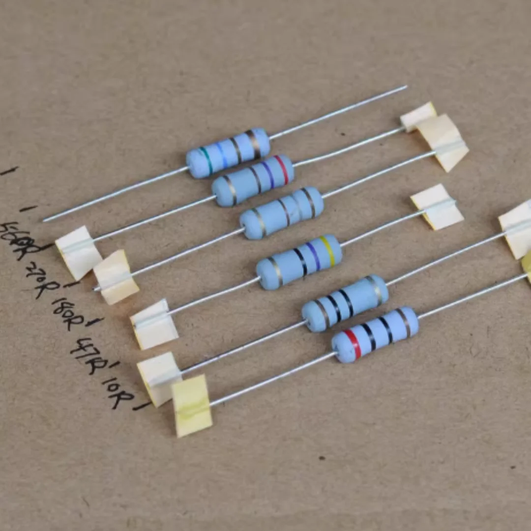 Imported Japanese KOA color-coded metal oxide film resistors with 3W power rating, 47R and 180R values, and copper terminals. 5%
