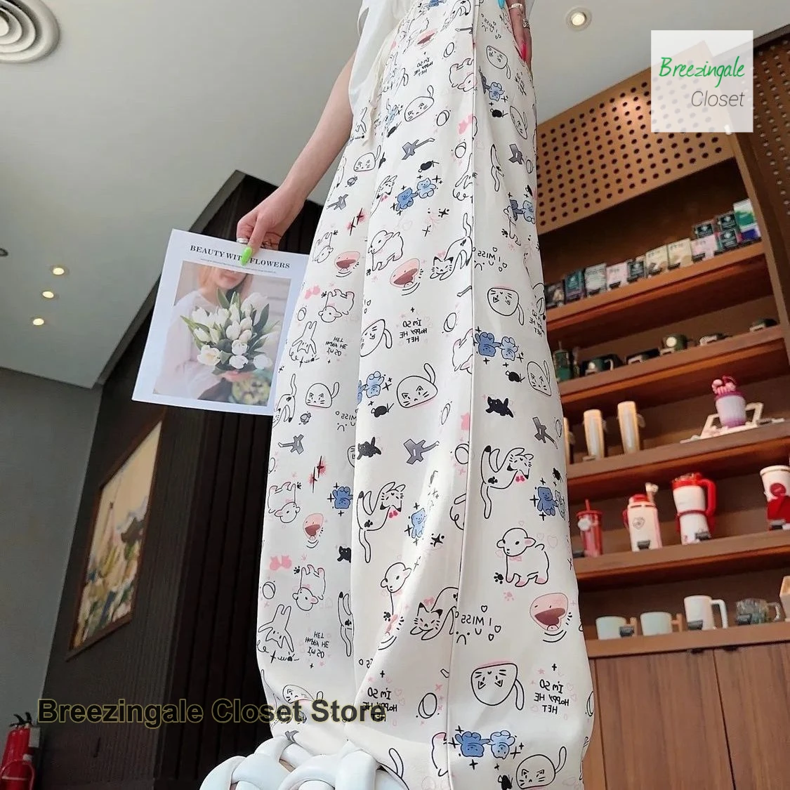 

American fashion niche graffiti printed ice silk casual pants women's summer new high waist slim Joker straight wide-leg pants.