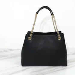 Elegant Everyday Essential: Luxurious Black Handbag Golden Chain Strap & Sleek Circular Accent Versatile Design All Occasions