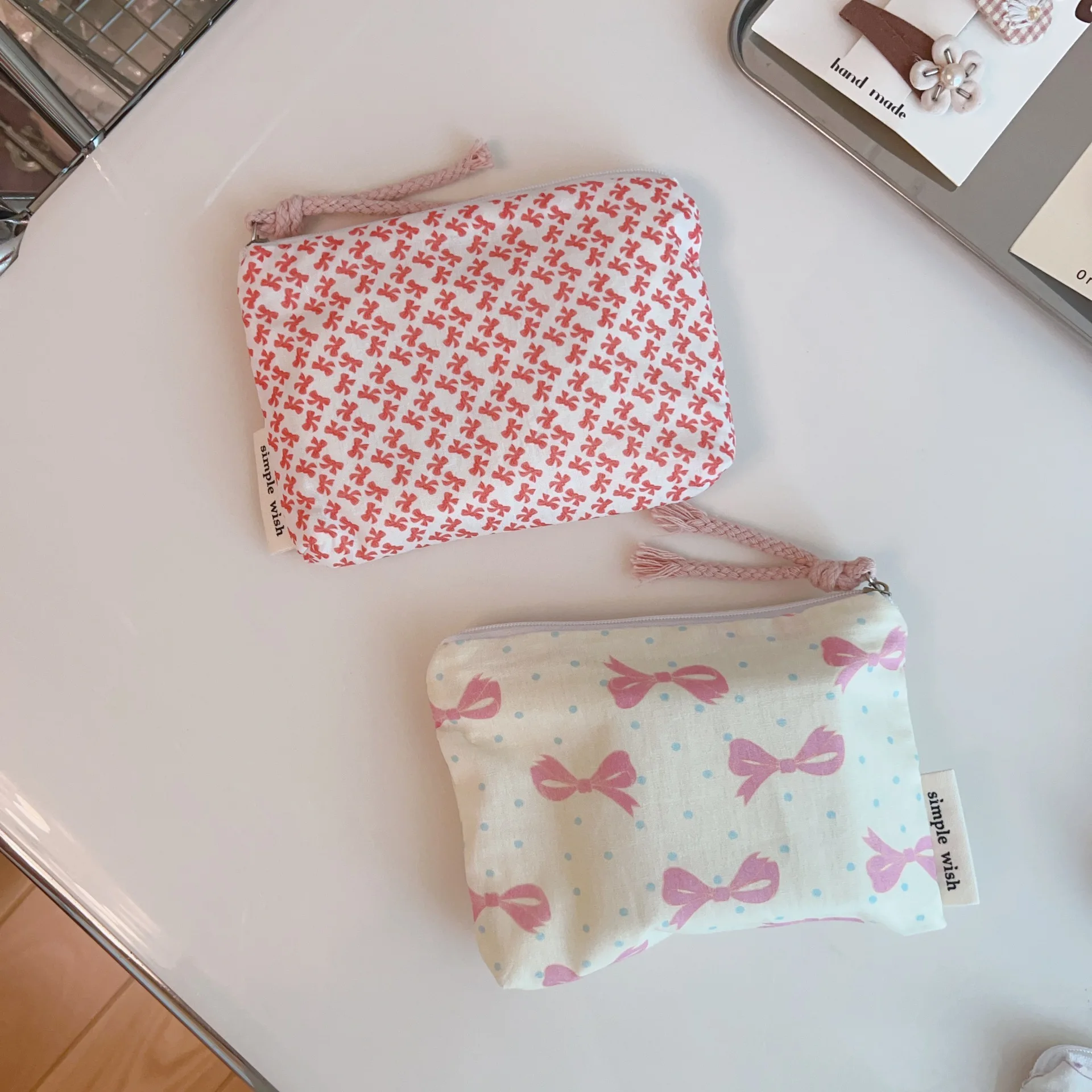 Elegante monedero con lazo, bolsa de maquillaje con lápiz labial floral, bolsa organizadora portátil de viaje, bolsa para tarjetas, auriculares, bolsa de almacenamiento para toallas sanitarias