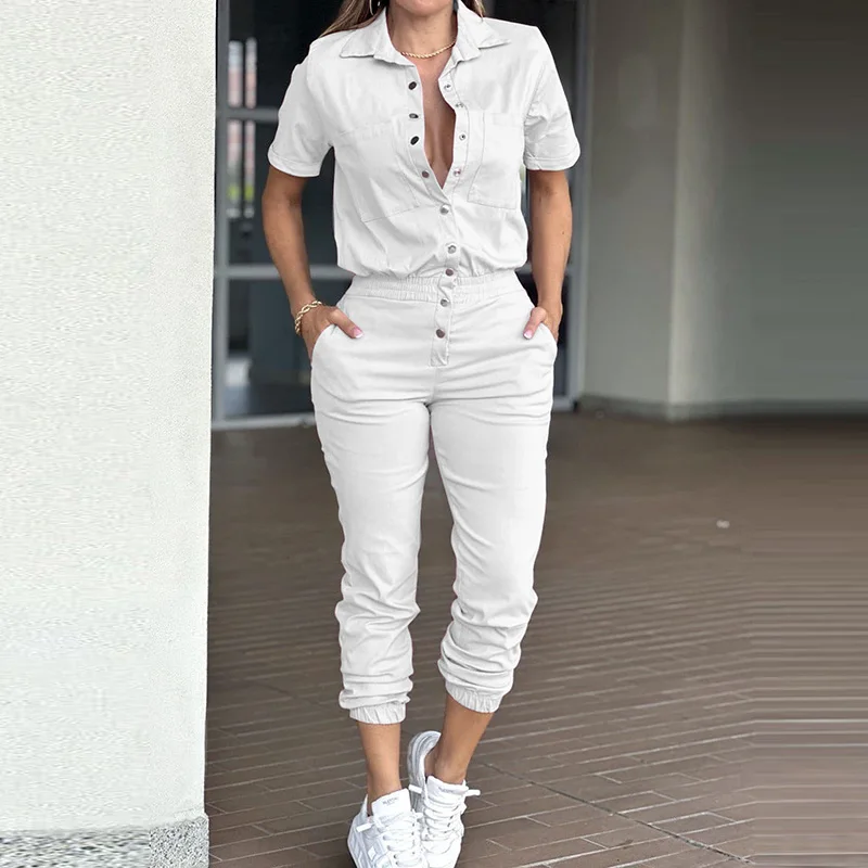 Elegante playsuits met revers en korte mouwen Chique elastische rompertjes met meerdere zakken High Street Fashion Effen jumpsuits met enkele rij knopen