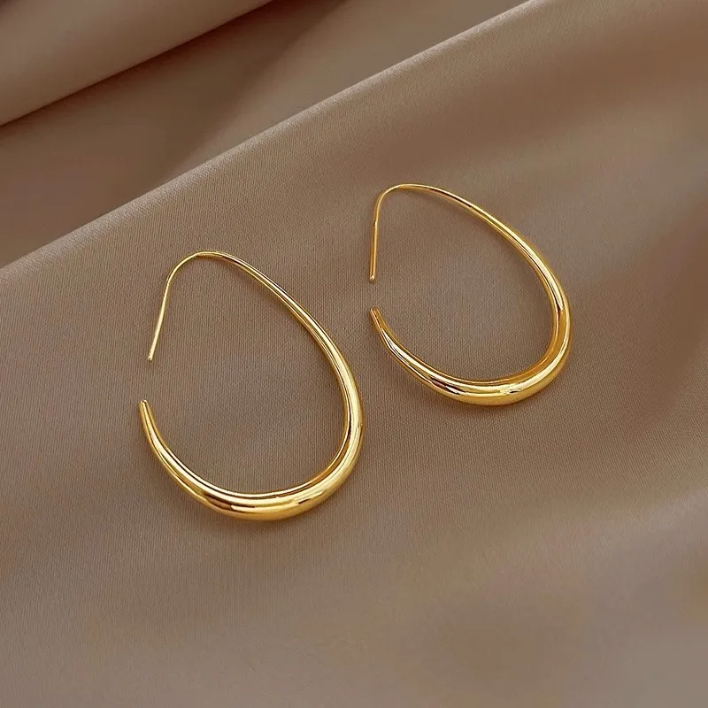 Pendientes de aro ovalados geométricos de Color dorado y plateado para mujer, Arete salvaje circular Simple, regalos de joyería para fiesta de cumpleaños