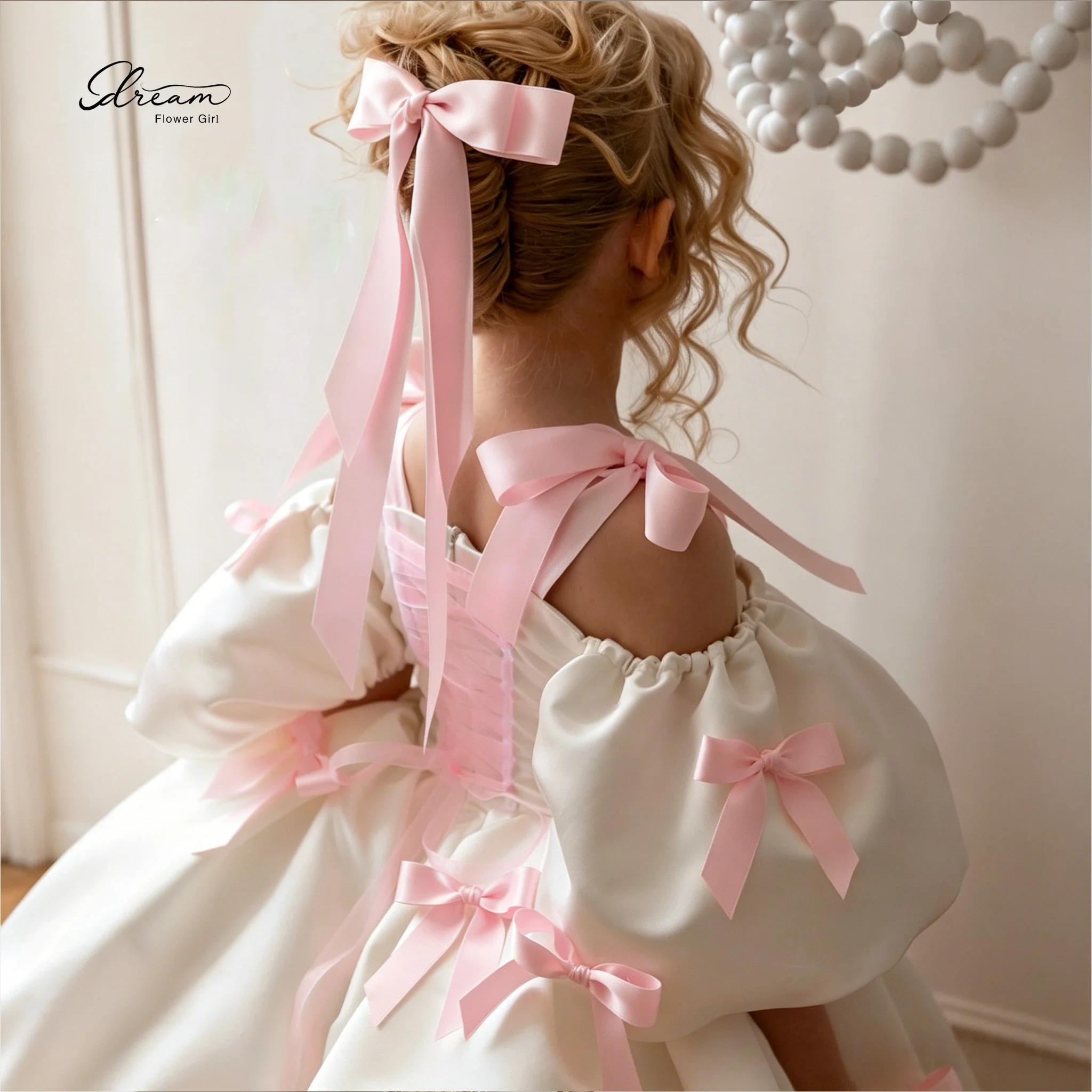 

White Satin Flower Girl Dress with Pink Bows Formal Children's Attire Featuring multiple bows short sleeves and a knee-leng