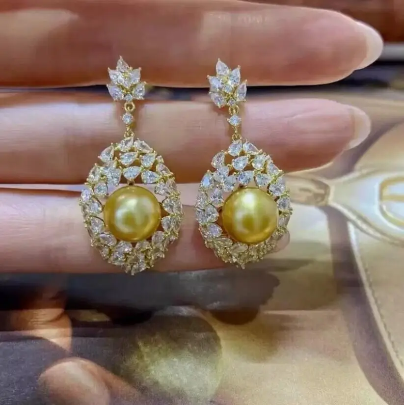 

Великолепные идеальные круглые серьги-гвоздики с золотым жемчугом Южного моря 9–10 мм 925S