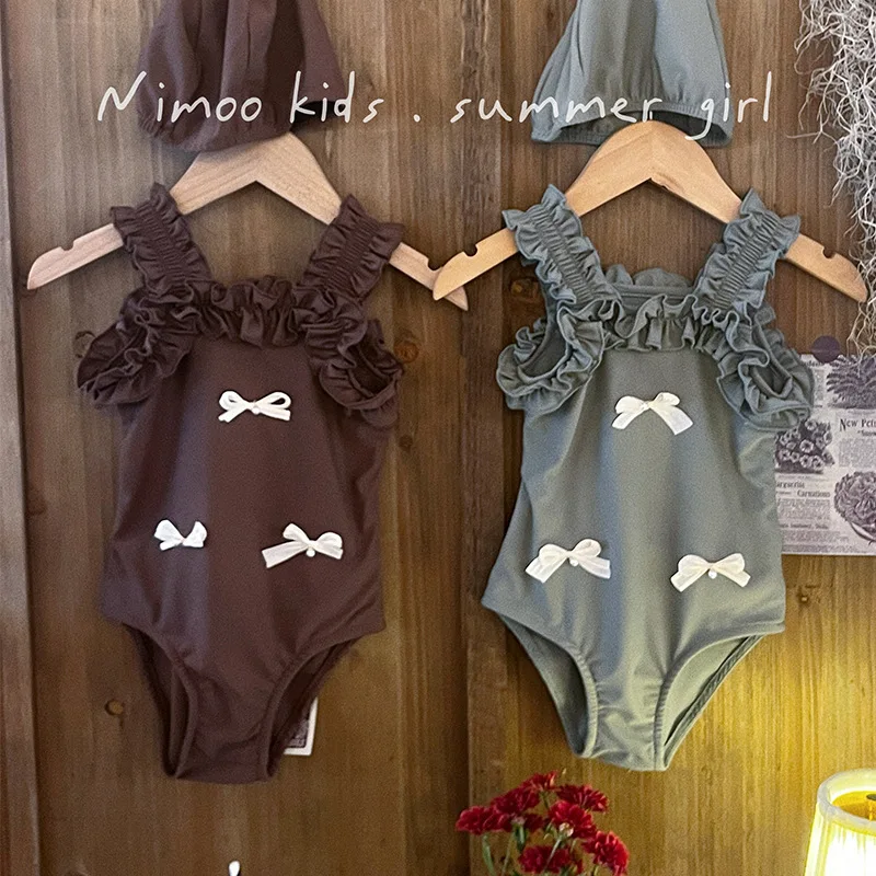 Traje de baño con lazo para niños, novedad de verano, moda coreana, bonito y dulce, traje de baño de una pieza con nudo, ropa para niñas