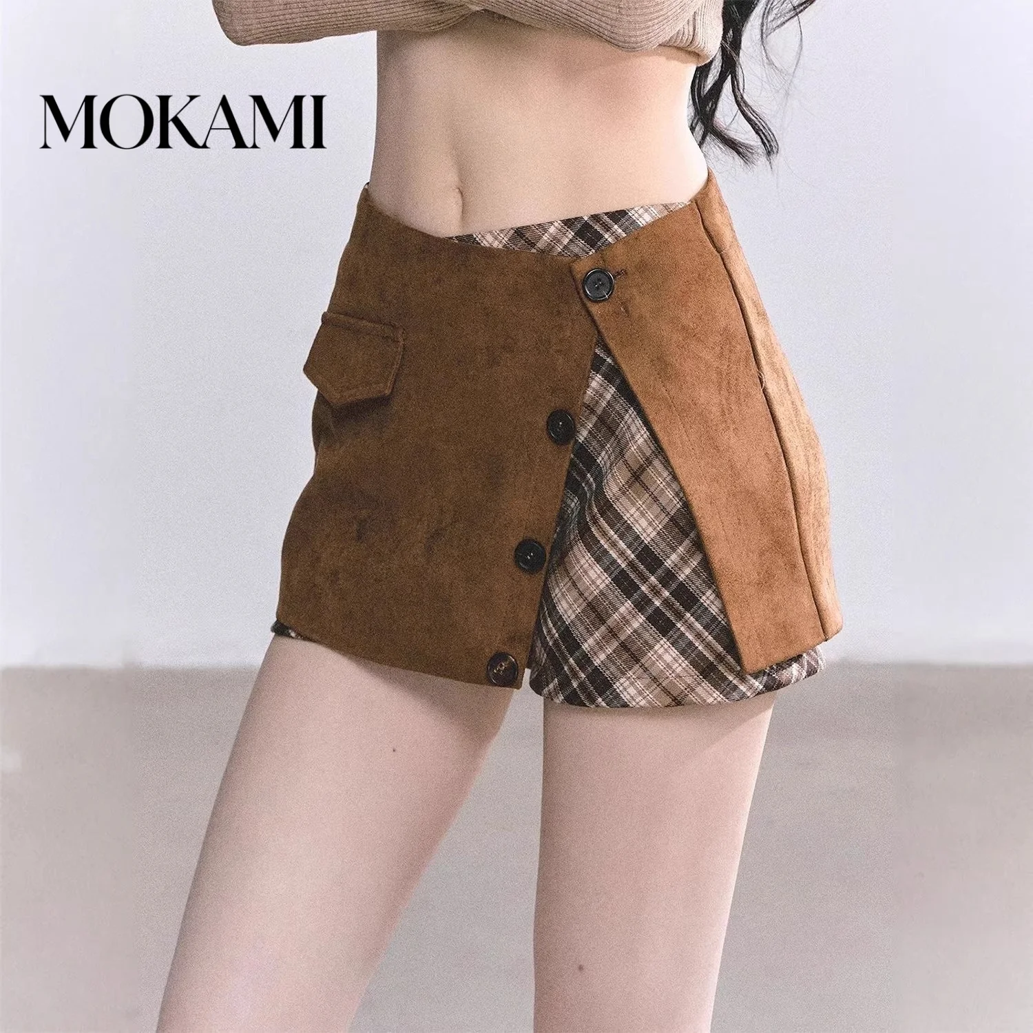 Fabric deer skin air layer irregular half skirt pants set for women's autumn new style temperament fake two pieces