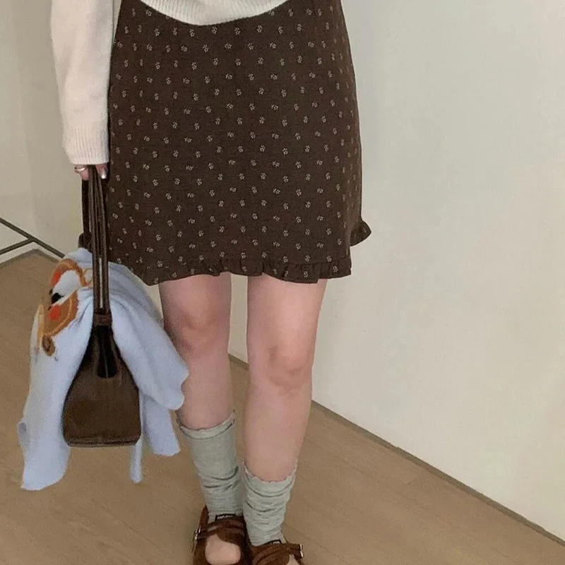 الأزهار عالية الخصر تنورة صغيرة النساء الخريف الشتاء خمر كشكش التنانير غير رسمية الكورية الرجعية ألف خط الحلو فضفاض الإناث التنانير جديد