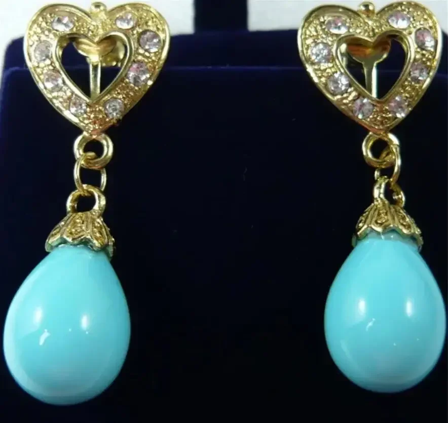 

Women's blue shell pearl drop retro personality love metal gilded Earrings