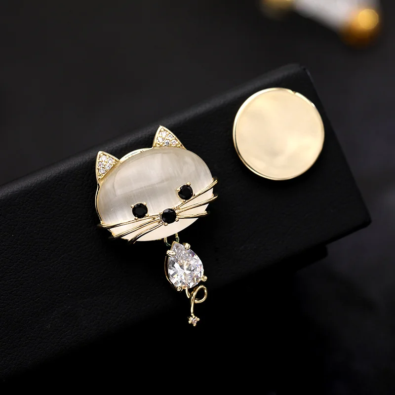 Anti-leak buckle cat's eye stone kitten iron stone brooch women's pin fixed cardigan accessories magnetic and convenient