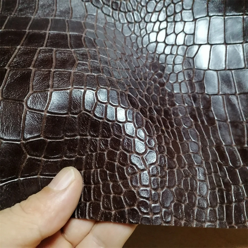 

1.2mm Dark Brown Crocodile Pattern Cowhide. Top-Grain Leather. Genuine Leather Fabric. DIY For Bags By Hand. Full Sheet Cutting